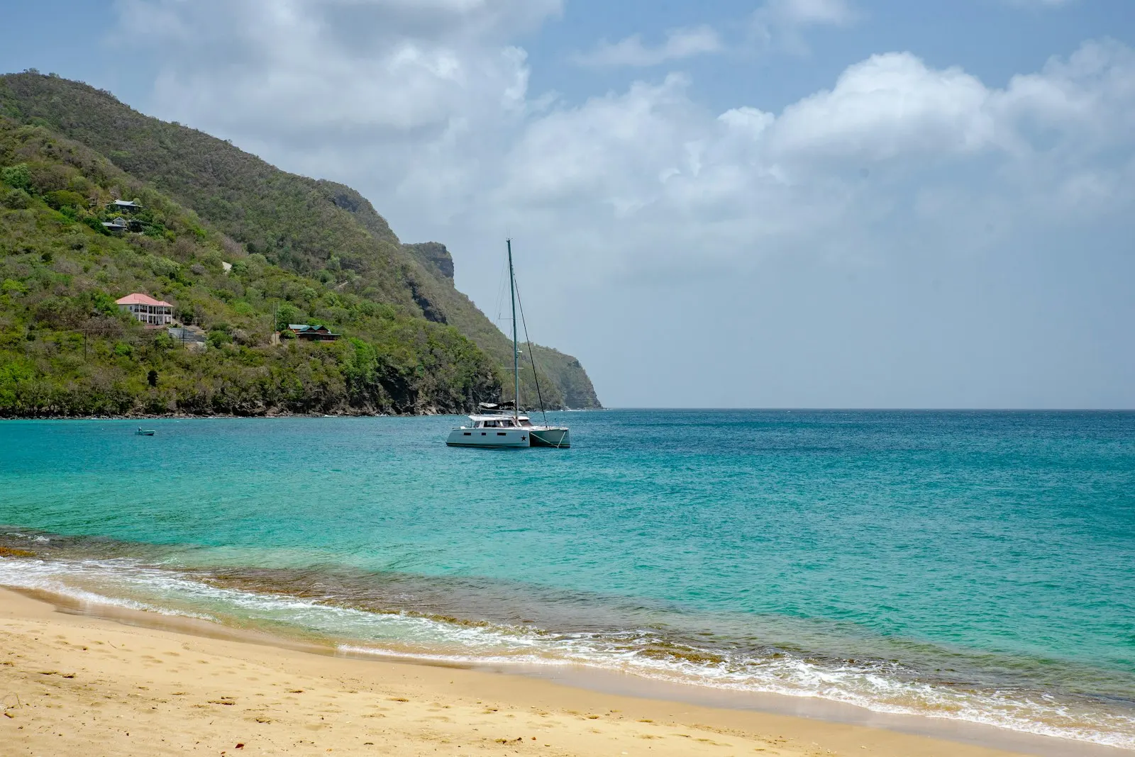 Bay and green hills in St Vincent and the Grenadines: St Vincent and the Grenadines citizenship by investment